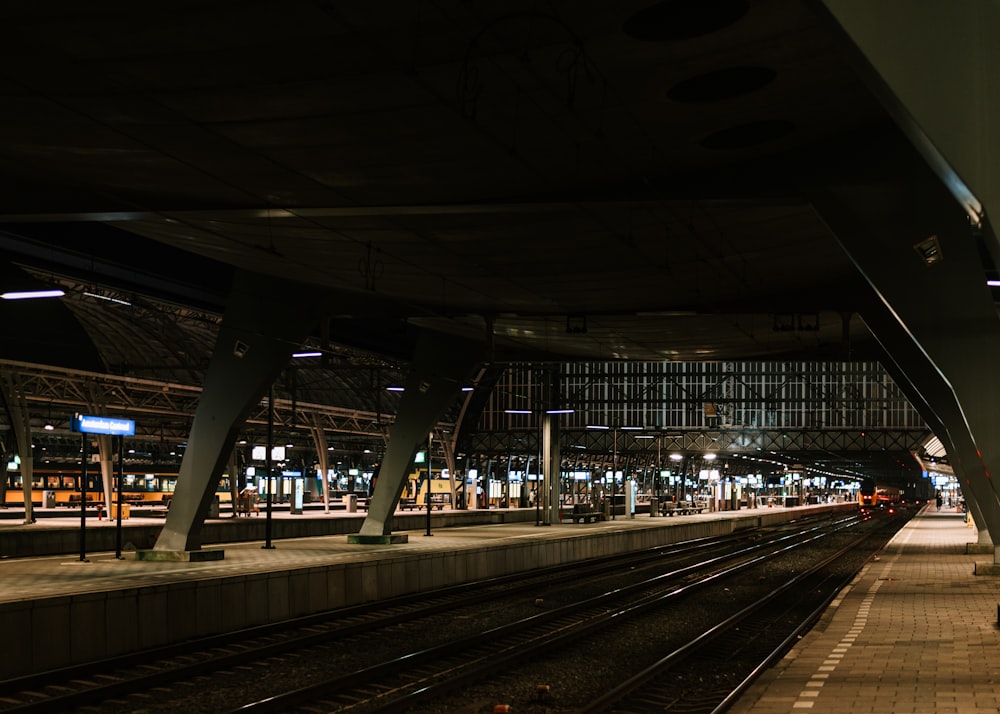 selective focus photography of train railings