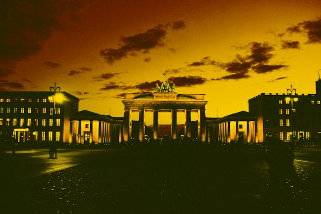 A historic landmark illuminated at night.