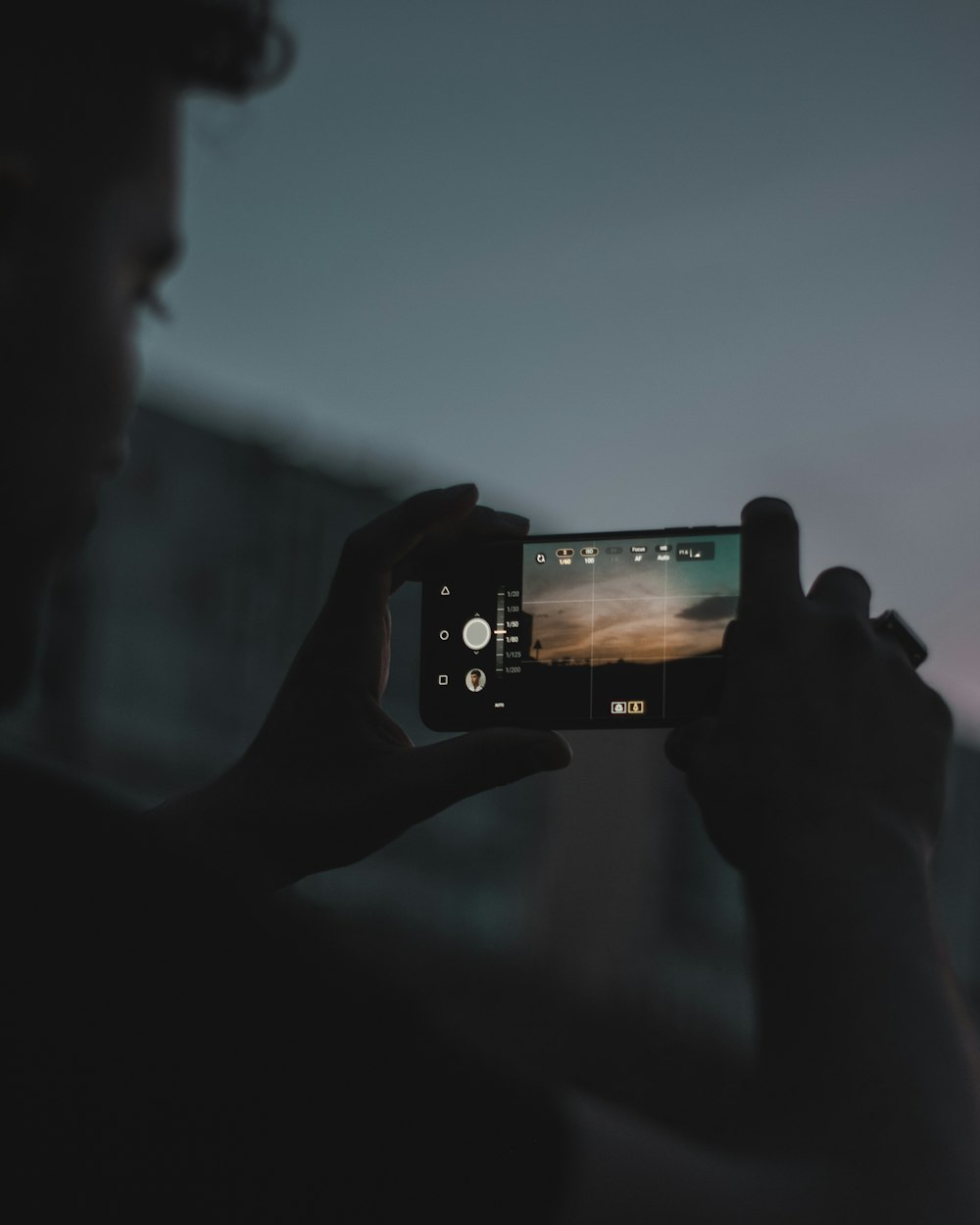 man holding smartphone