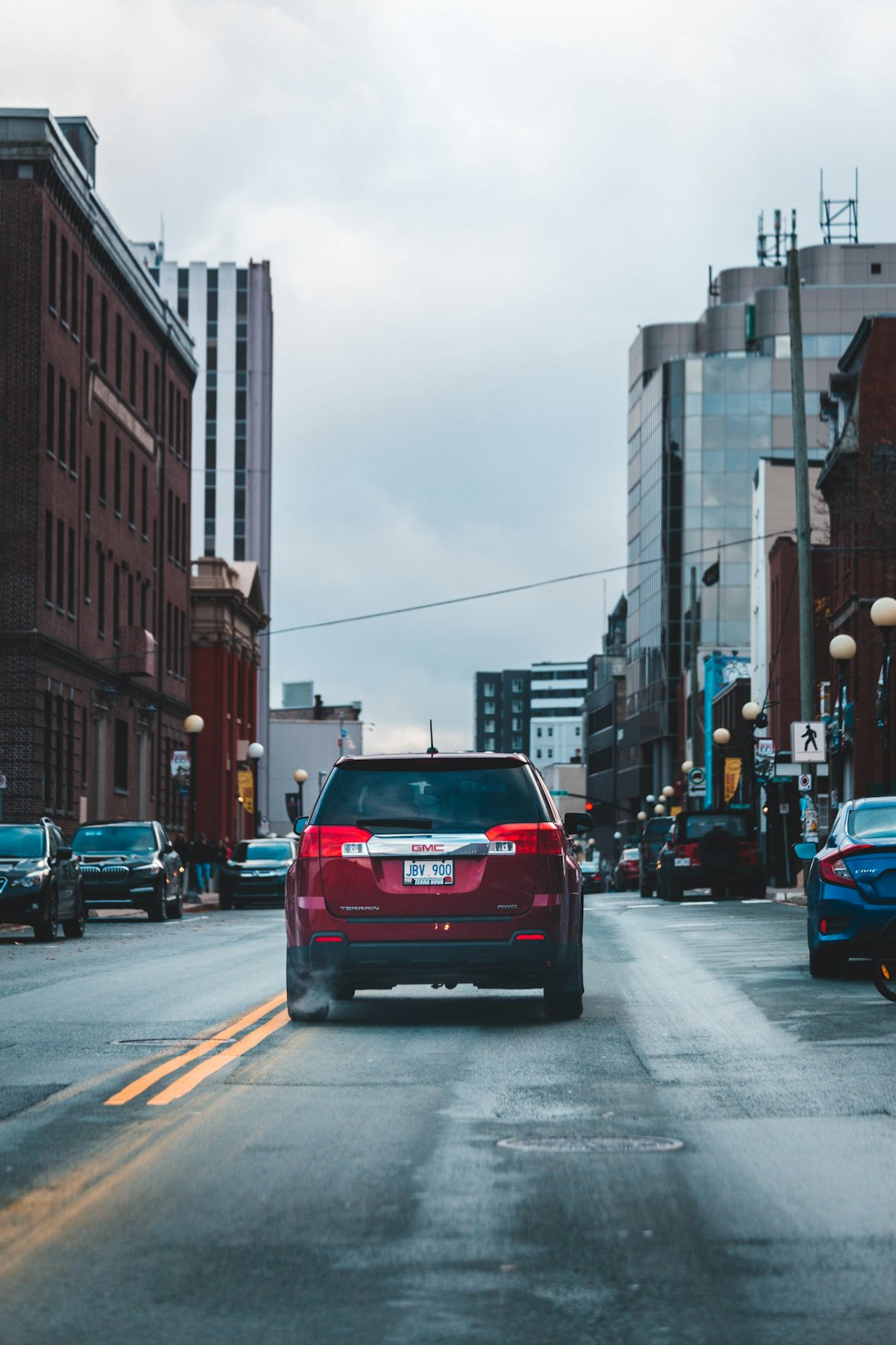 red car on road