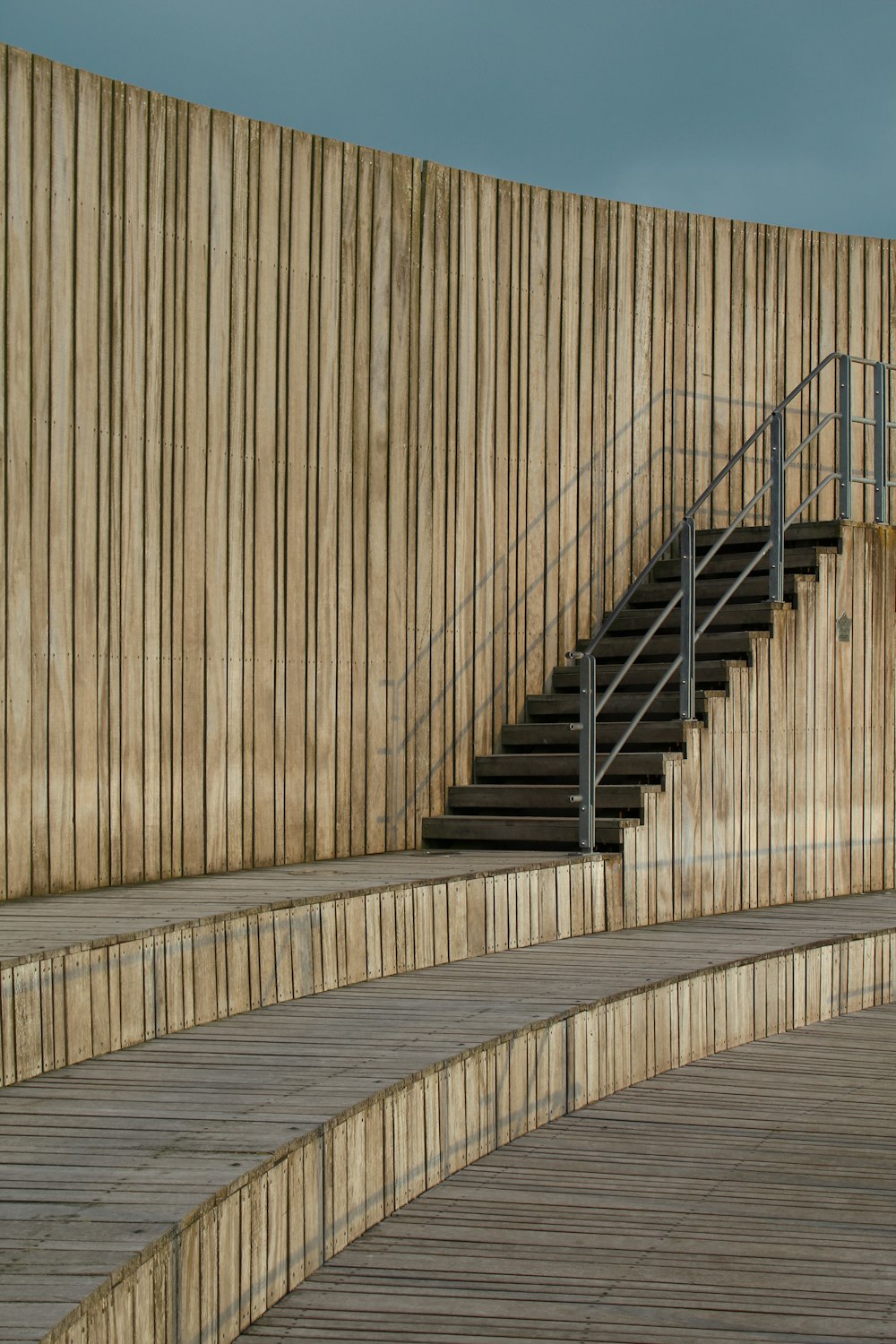 a man riding a skateboard down a wooden ramp