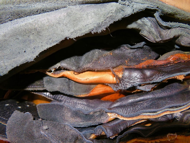 Premium leather hides displayed in various colors and textures.