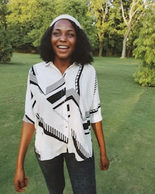 Smiling person enjoying a healthy morning outdoors surrounded by nature.