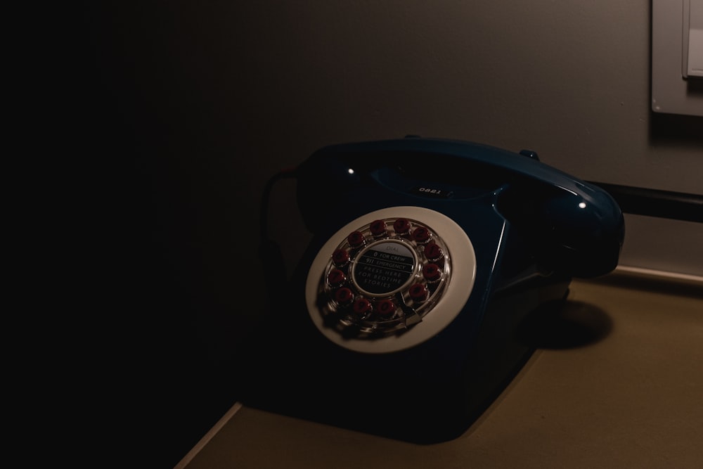 blue and white rotary telephone