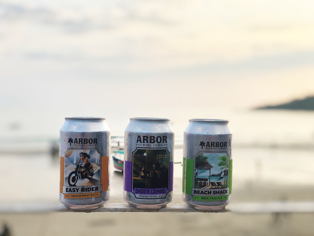 three Arbor soda cans