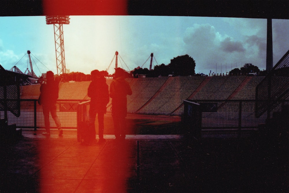 a group of people standing next to each other