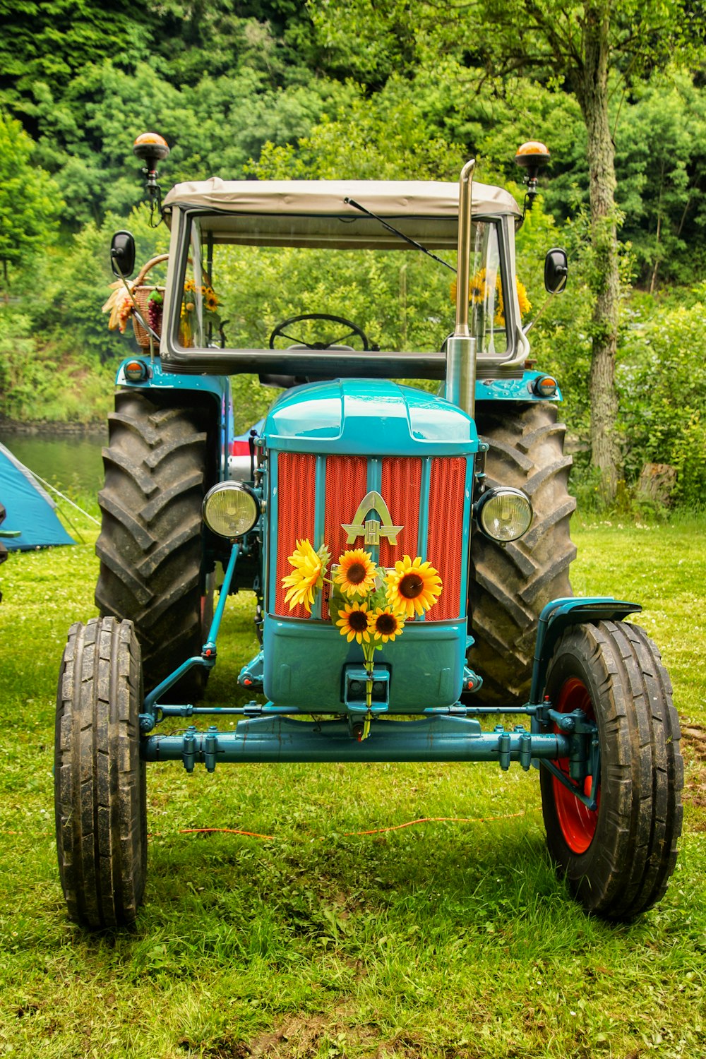 teal and white tractor