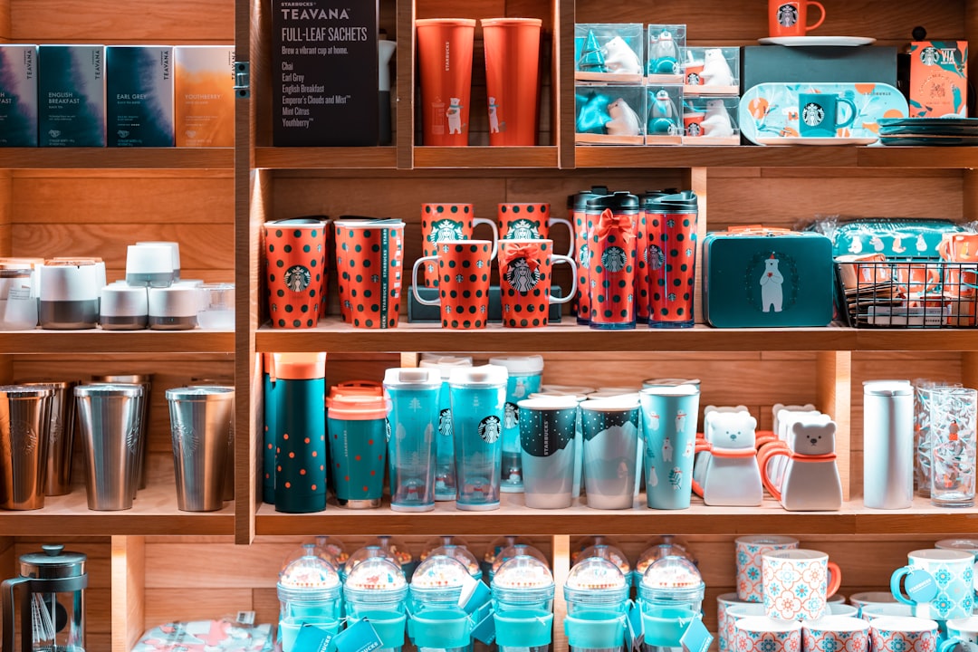 mugs and cup on shelf