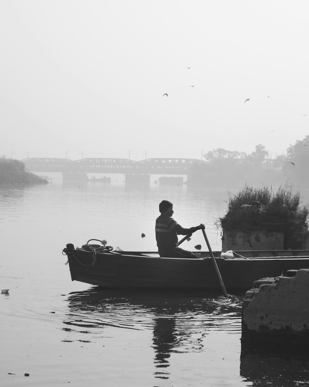 man riding boat