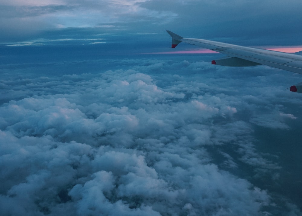 flying plane during golden hour photo – Free Blue Image on Unsplash