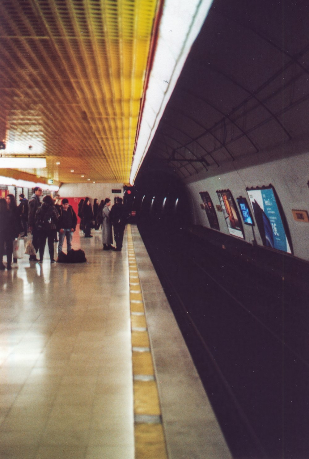 people waiting in the train station