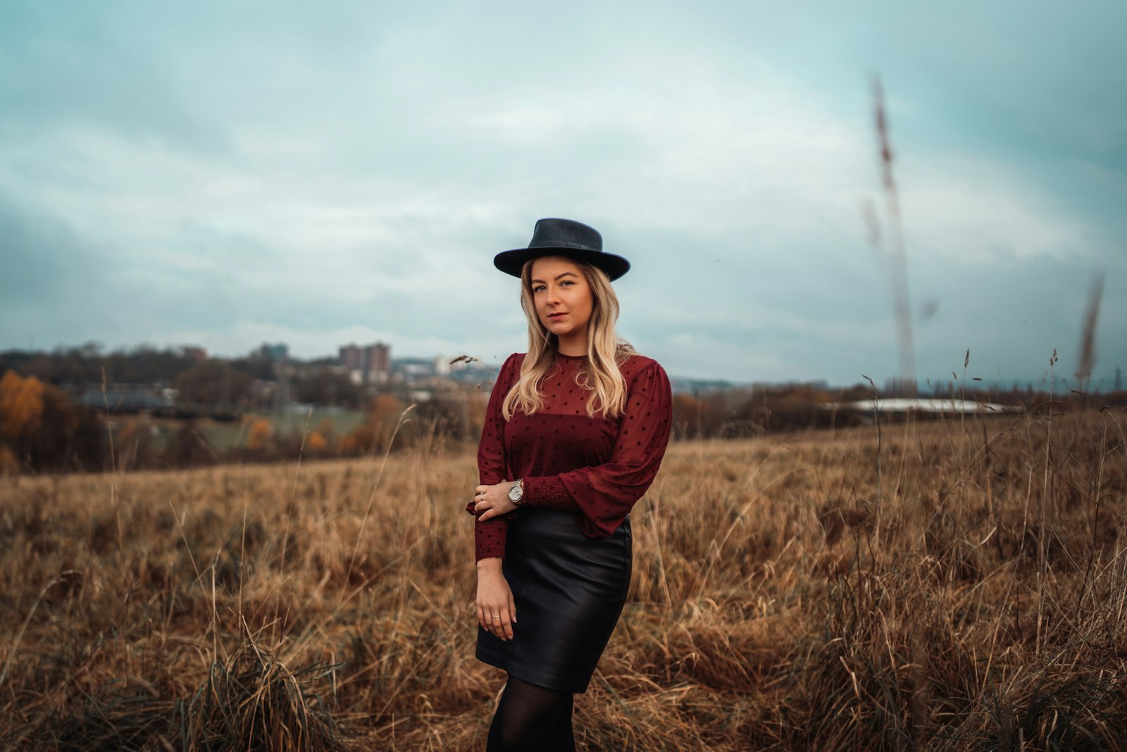 Sony a7 III + Samyang AF 35mm F1.4 FE sample photo. Woman in maroon long-sleeved photography