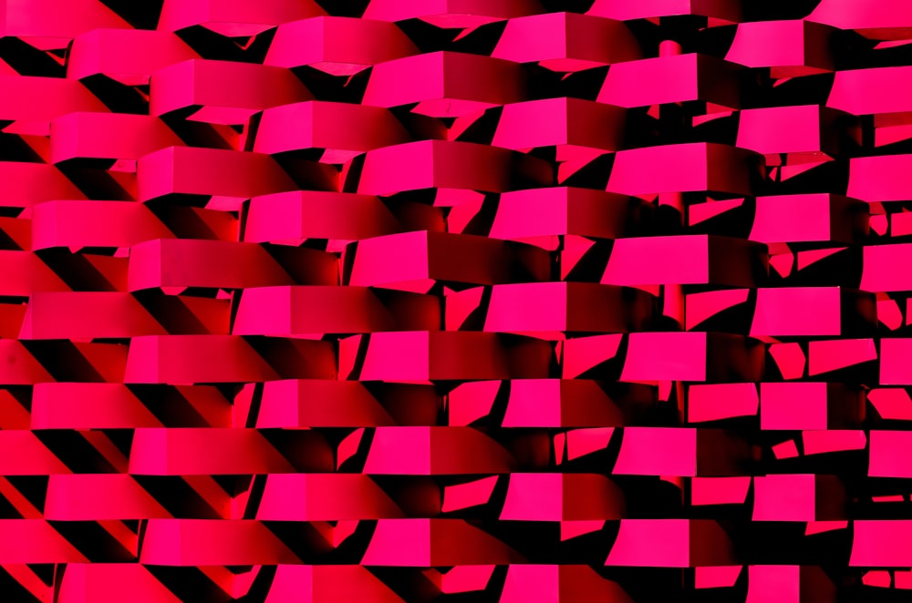 a red and black background with a lot of squares
