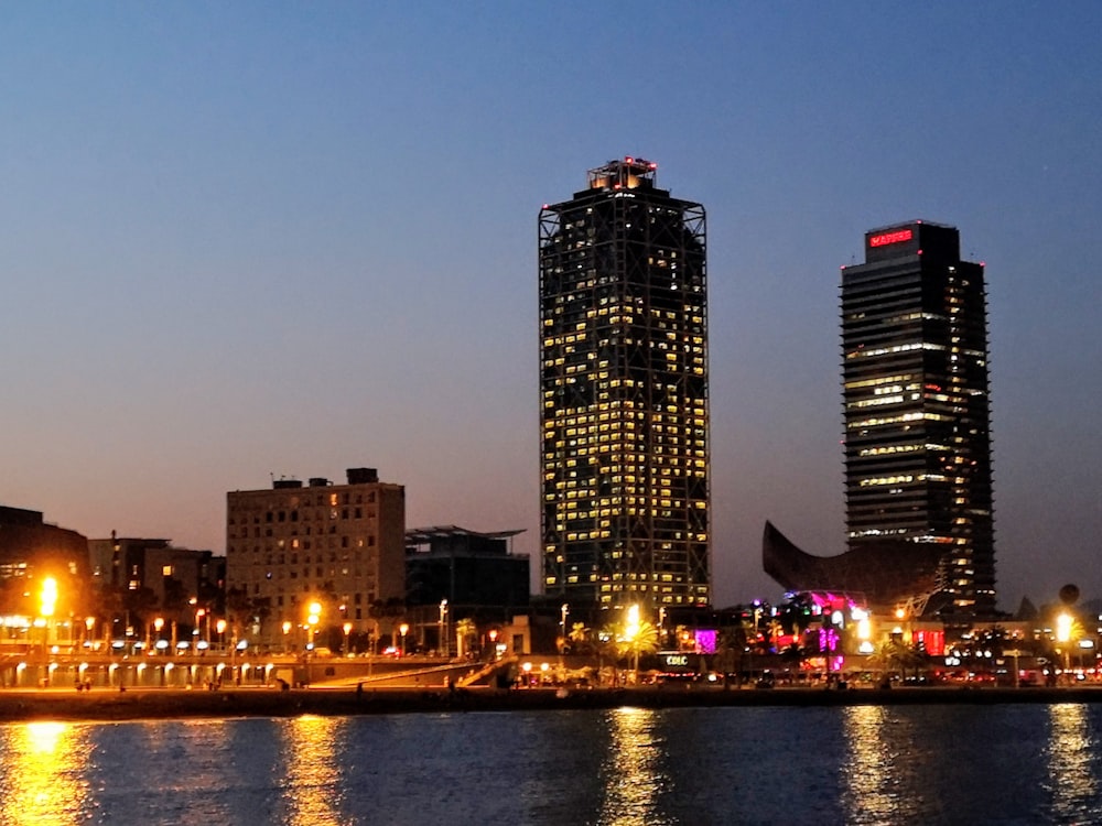 a view of a city at night from across the water