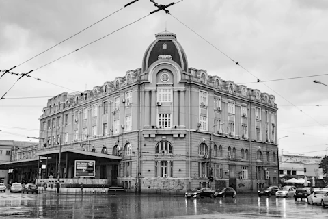 grayscale photo of building across the street