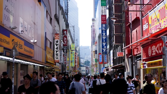 people standing near buildings in Akihabara Japan