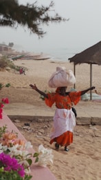 senegalese woman with arms open