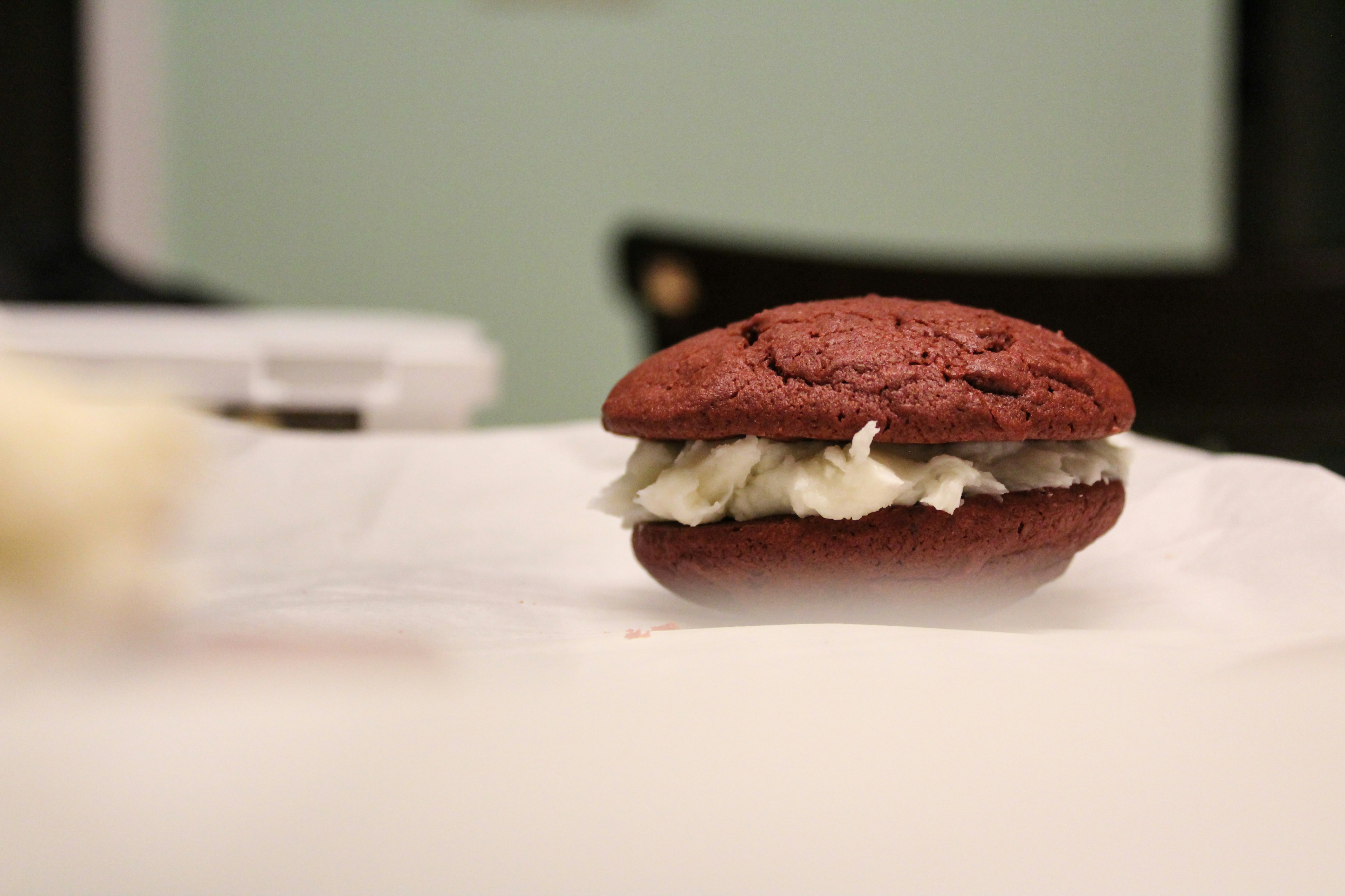 french macaroons on white textile
