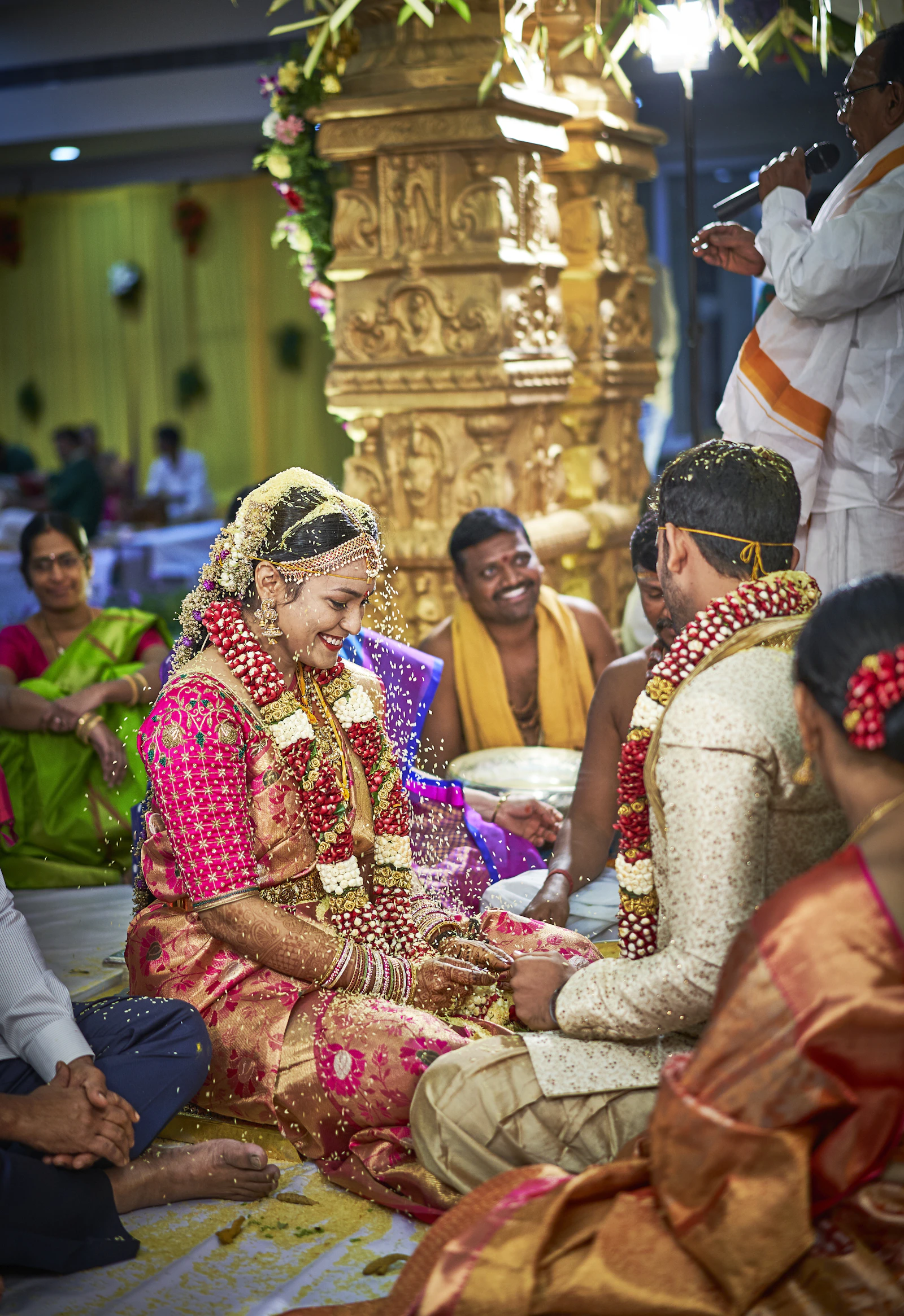 A South Indian couple seated during the ceremony.