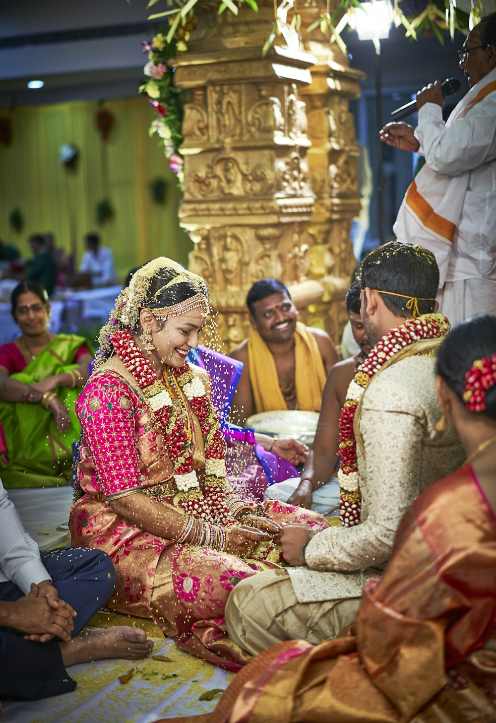 people gathering in wedding ceremony surrounded with people