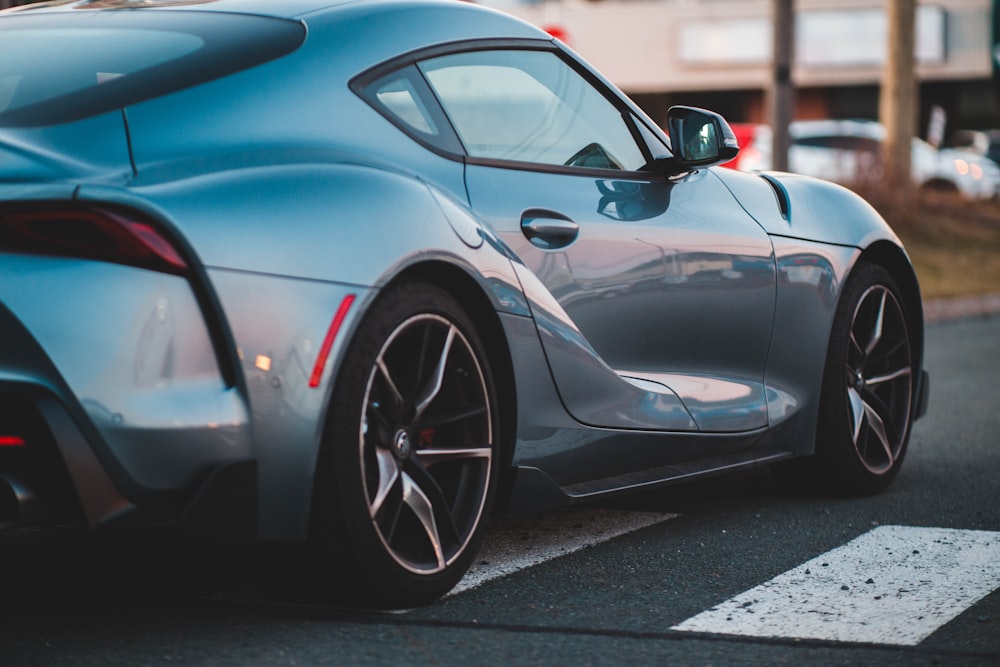 silver Toyota Supra coupe