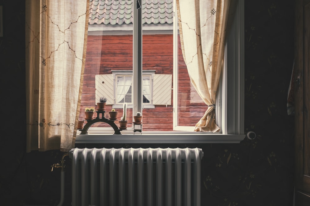 kerosene heater by window during daytime