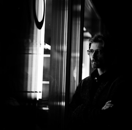 A dark-themed image representing a thoughtful blogger.