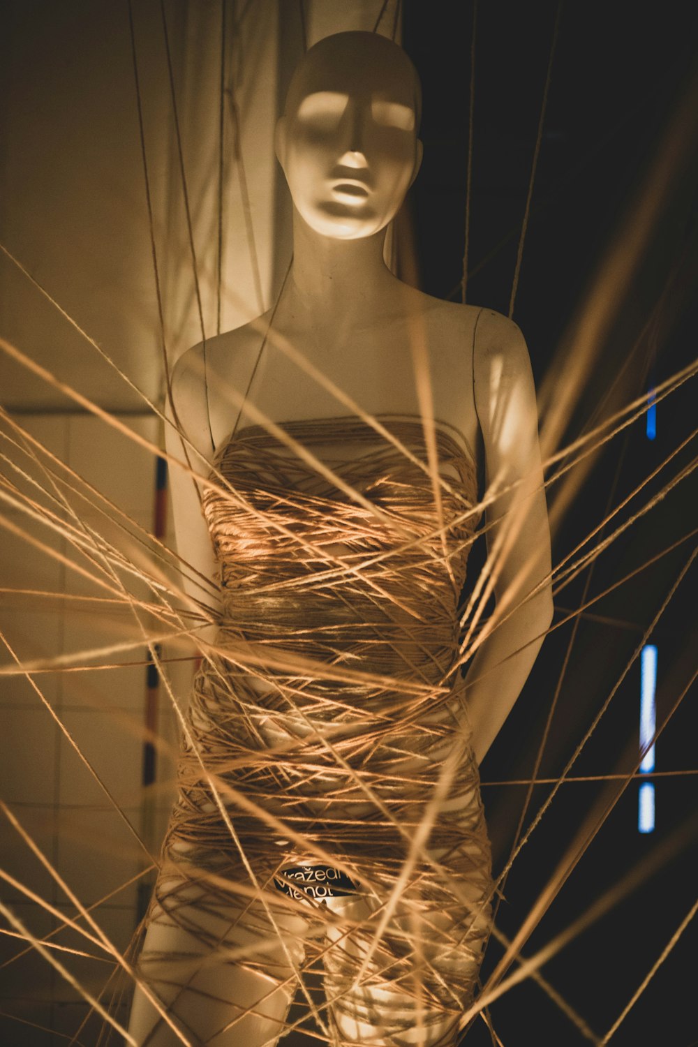 mannequin with brown threads