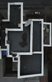 An aerial view of a complex roofing system.