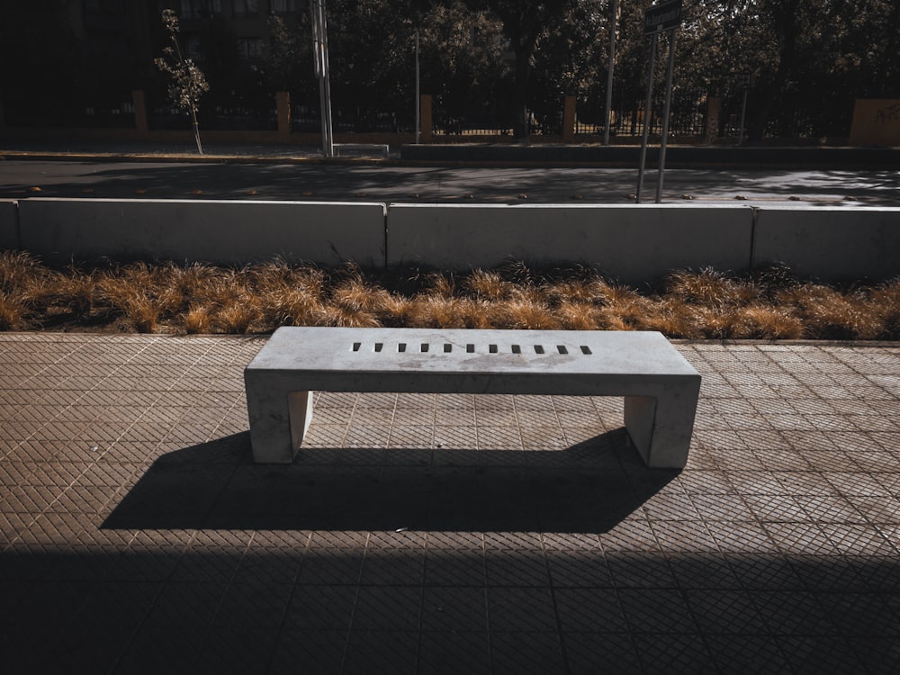 bench on concrete pathway