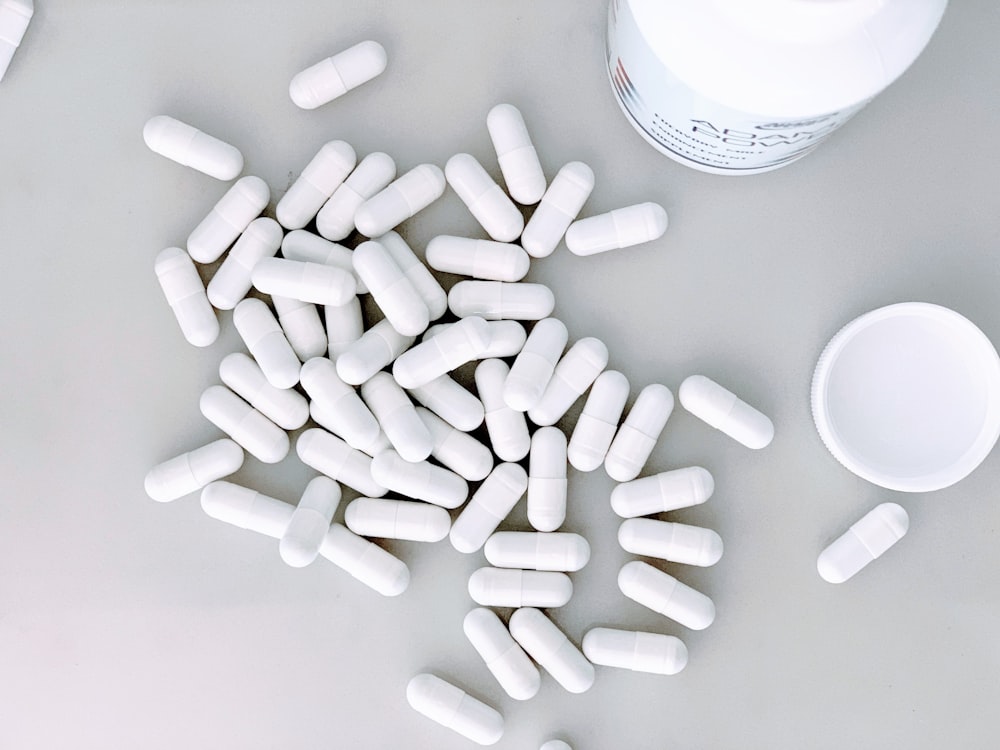 white medication capsules