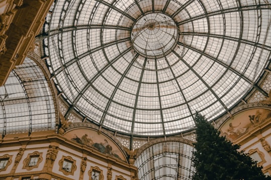 low-angle photography of a dome building glass ceiling in Galleria Vittorio Emanuele II Italy