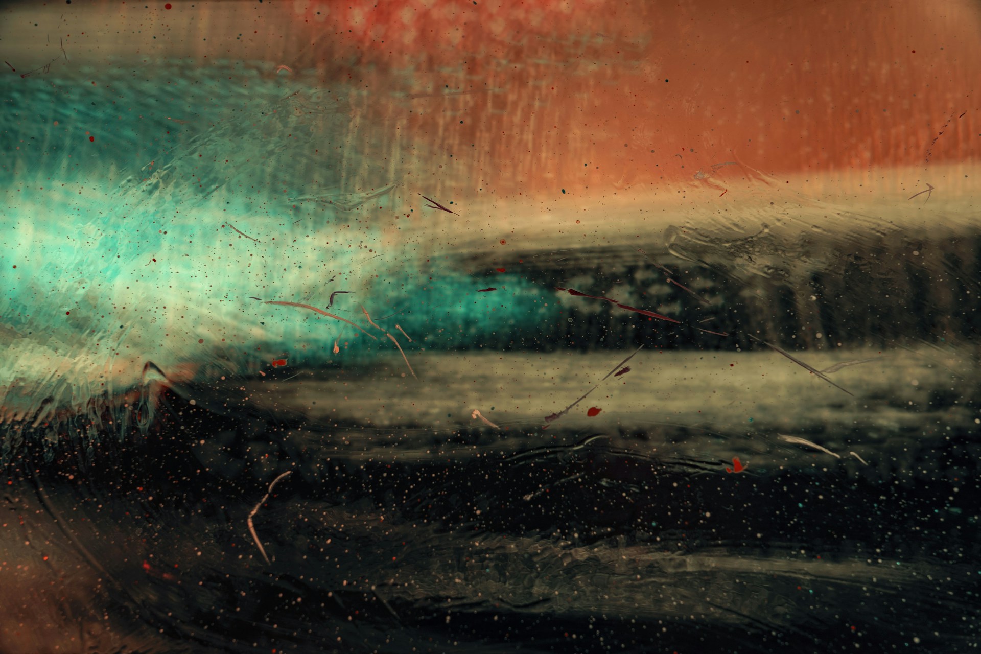 a blurry image of a car in the rain