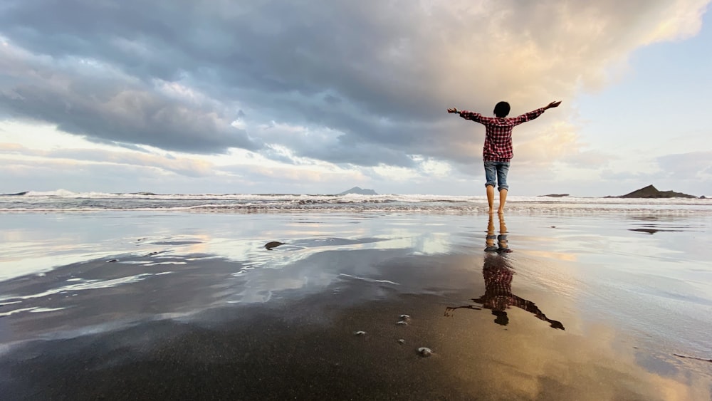 person standing on shore