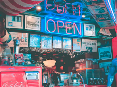 red lighted neon open signage