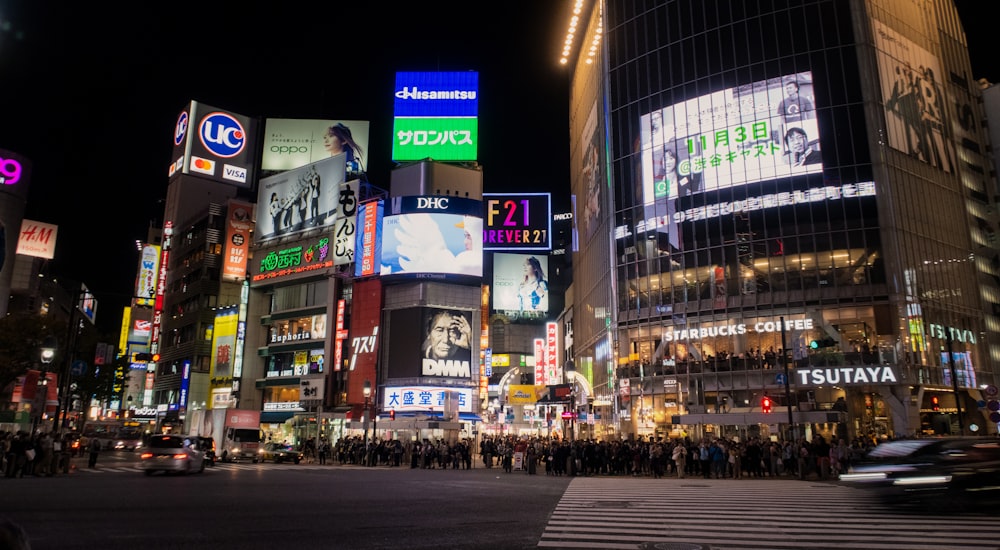 buildings with signages at night time