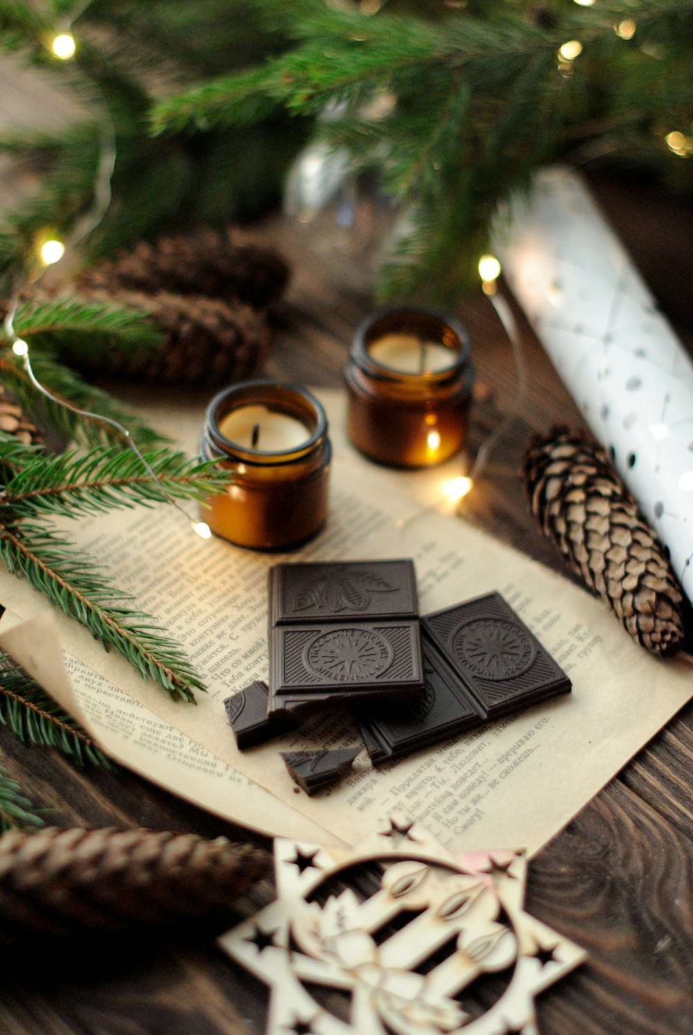 chocolate bars beside brown glass containers \