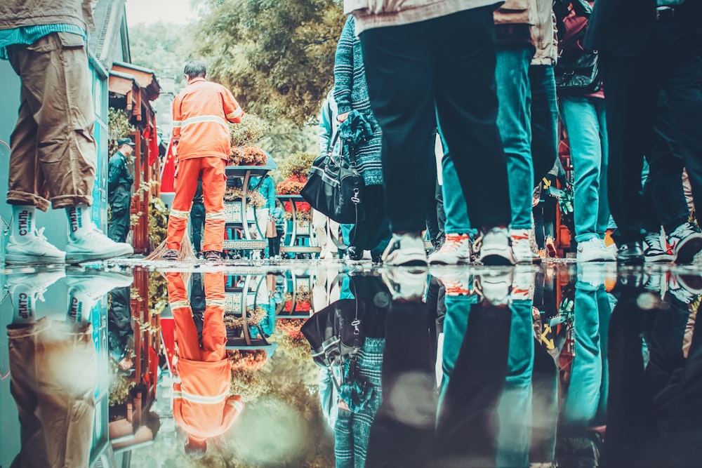 a group of people standing next to each other