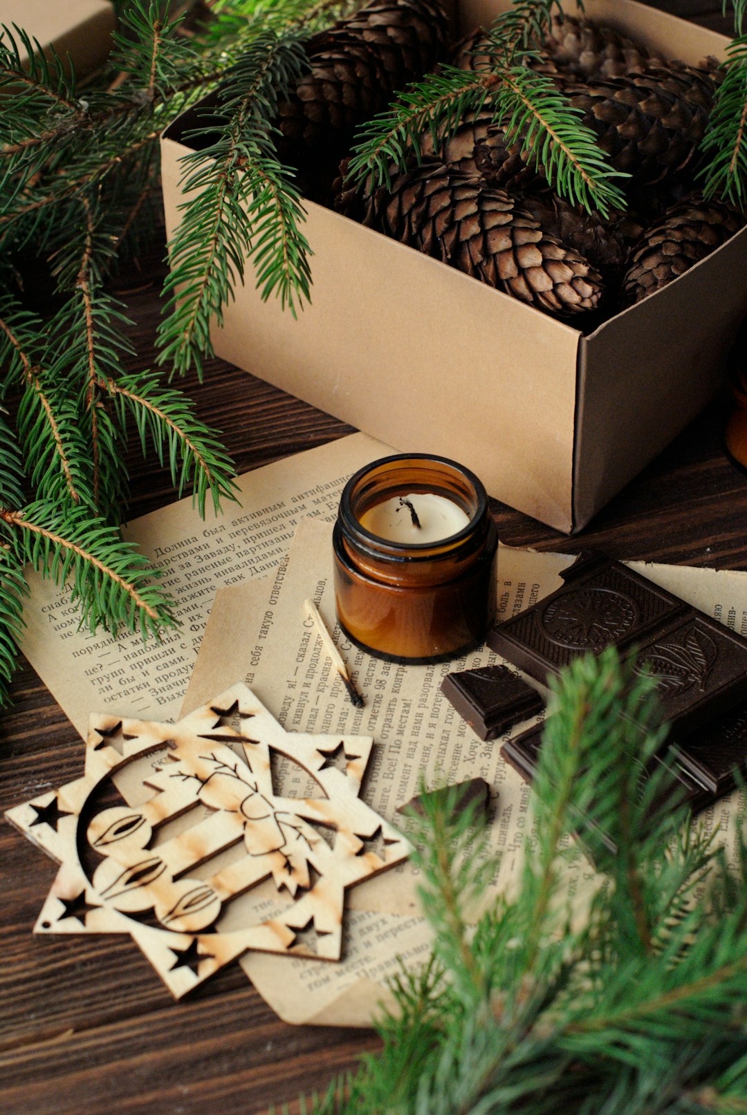 brown votive candle and pyrograph star decor