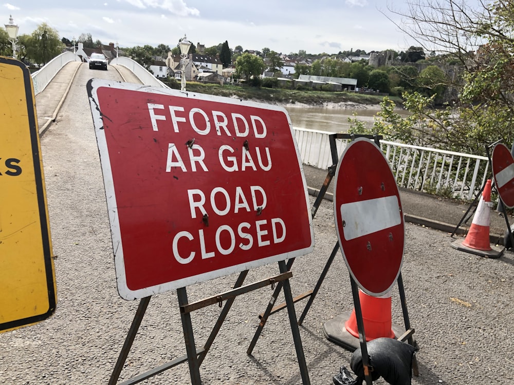 board signs blocking a road