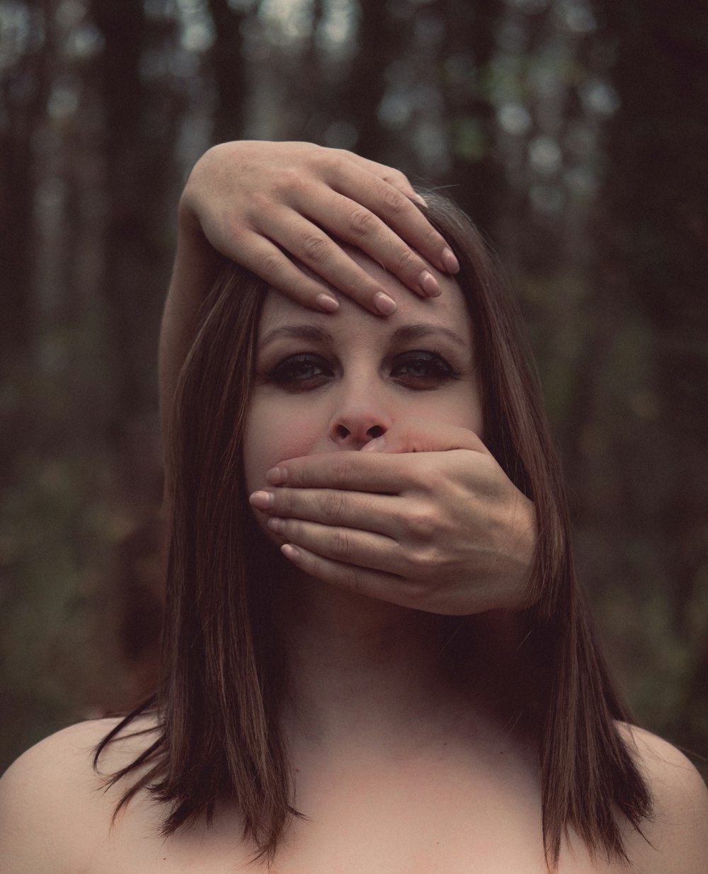 woman standing near trees