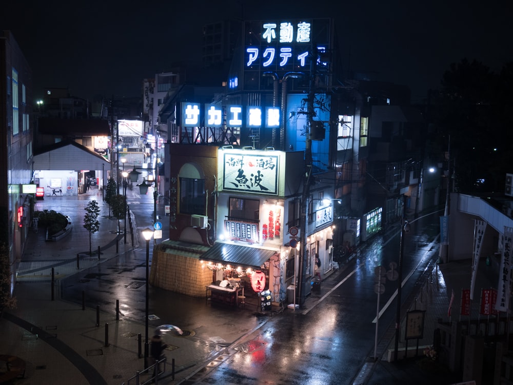 lighted concrete building at night