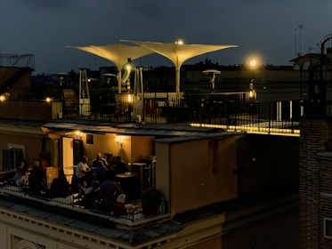 Exclusive outdoor terrace with ambient lighting, perfect for intimate gatherings under the stars.