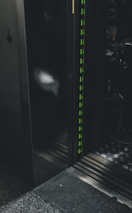 A patient being transported in a hospital elevator.