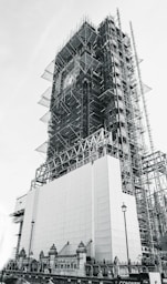 low-angle grayscale photography of an unfinished high-rise building