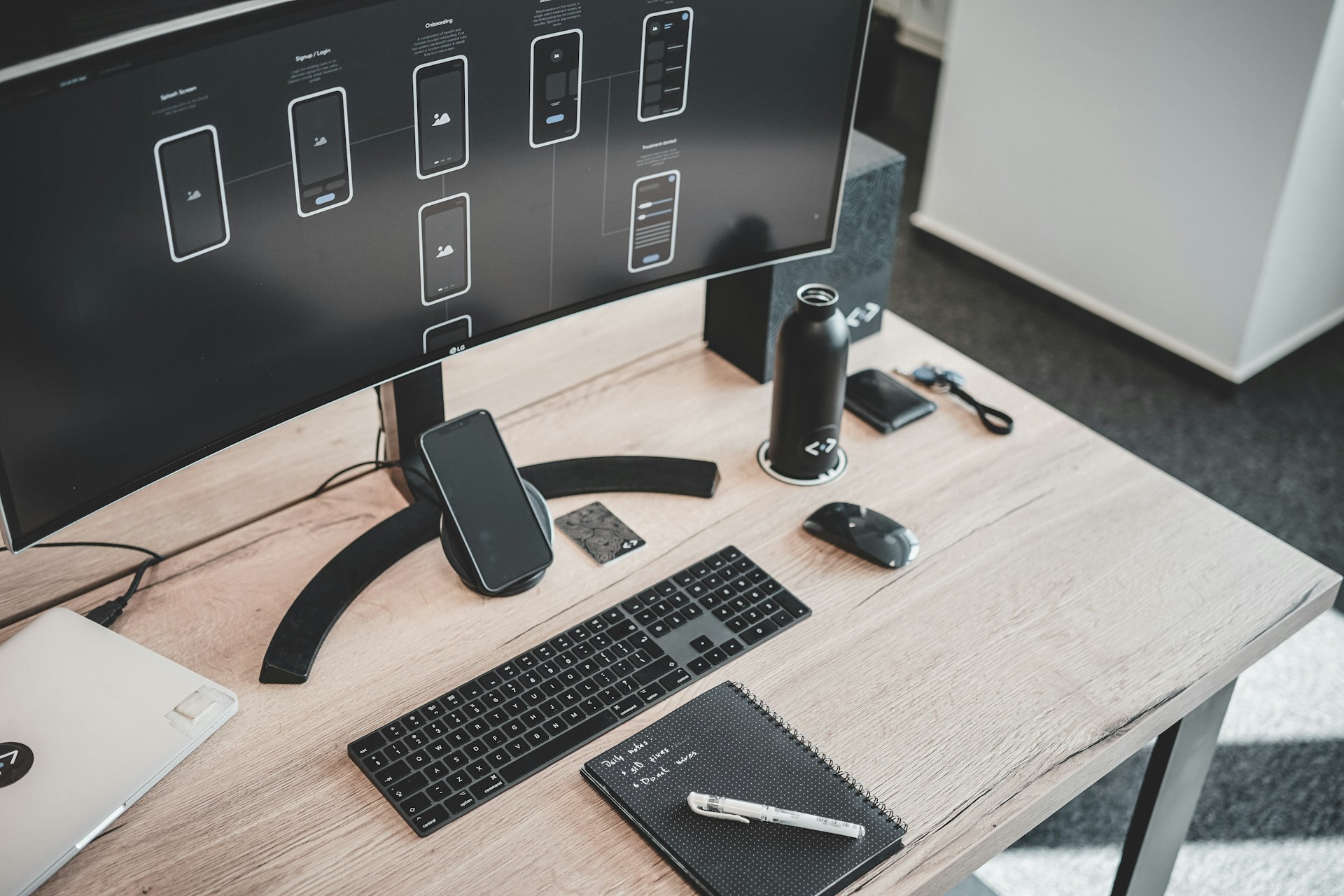 computer set turned-on on wooden table