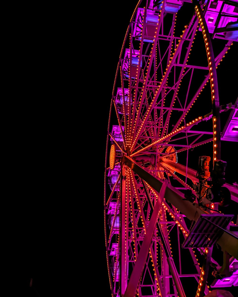 low-angel photography pink and brown ferriswheel