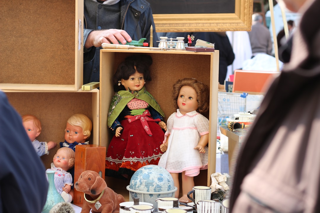 assorted dolls on boxes