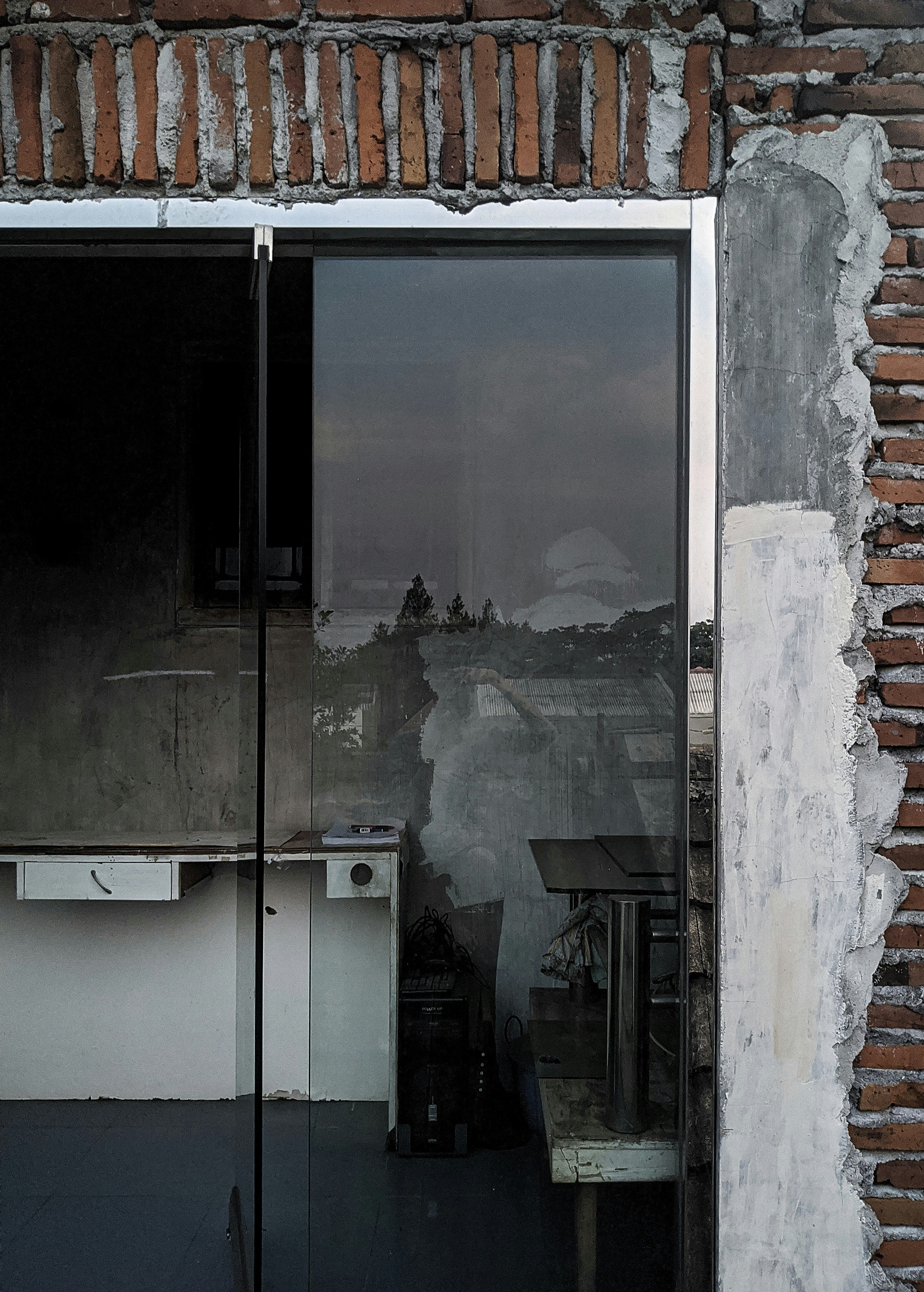 Frameless glass door at a shop entrance