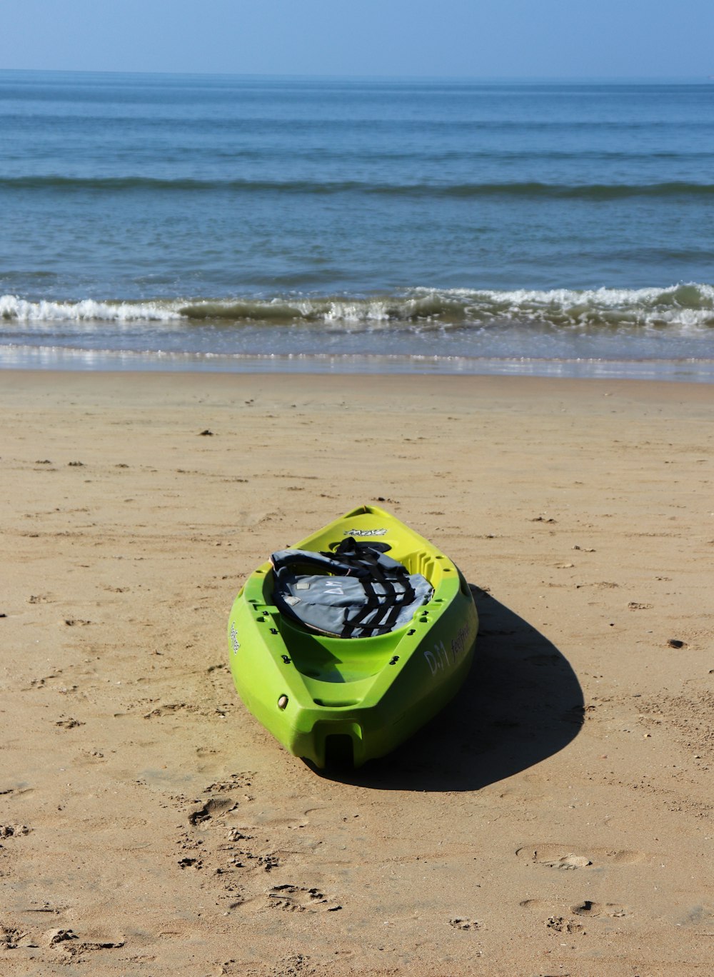 kayak on seashore during day